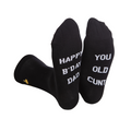 Black rude slogan socks with white happy b day dad and you old cunt text and gold logo on the heel for dad gift