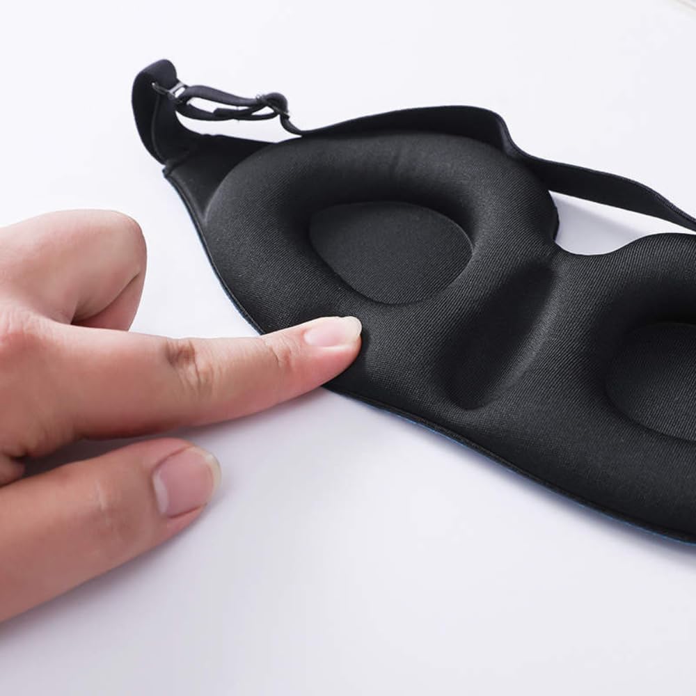 Black silicone funny sleep mask with contoured eye openings and adjustable elastic straps for comfortable rest