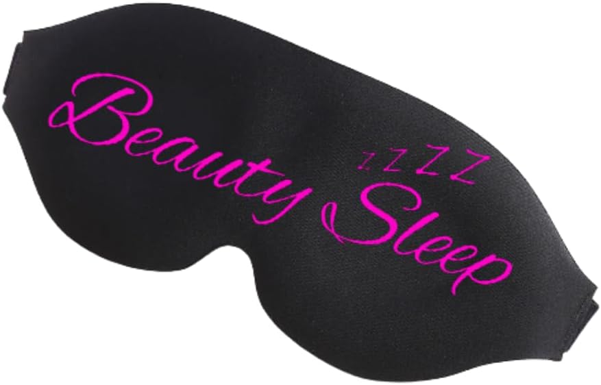 Black fabric sleep mask with pink embroidered beauty sleep text and three zzz symbols for funny sleep mask use