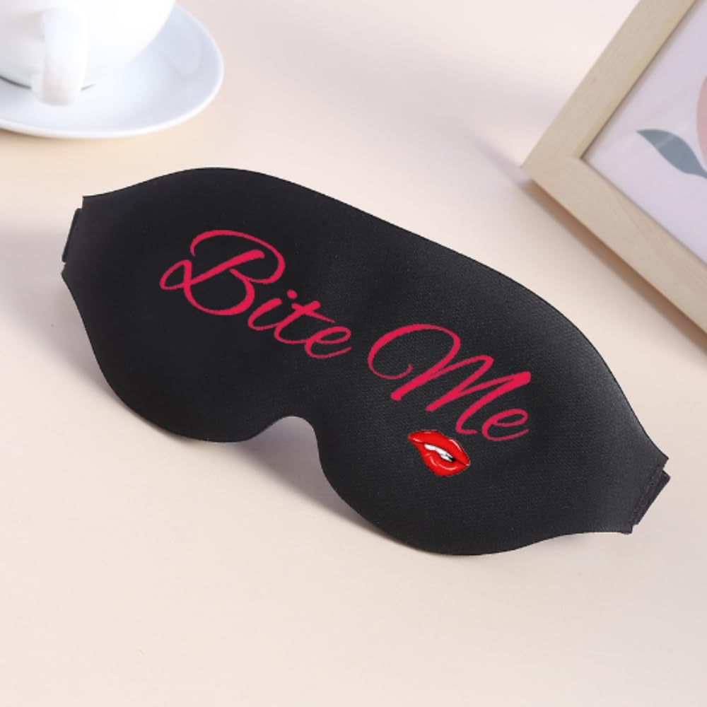 Black sleep mask with pink bite me embroidery and red lips emblem designed for funny bedtime use