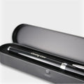 Black pen with silver accents engraved with cheeky c**t slogan nestled in a sleek black case