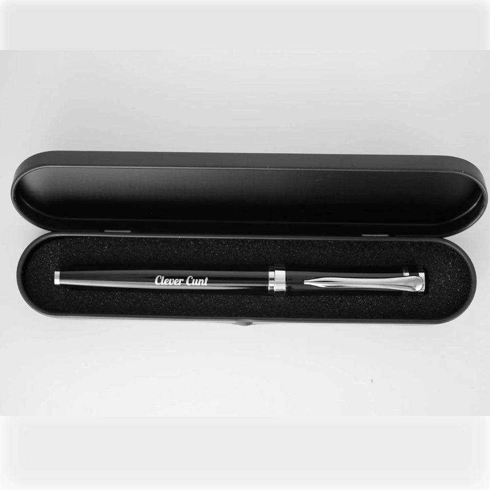 Black fountain pen with silver accents and engraved clever cunt text resting in a black case for funny slogan pen