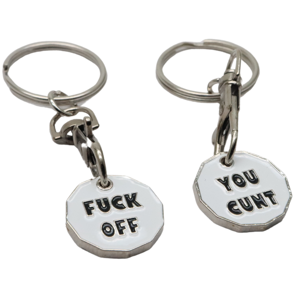 Silver-toned octagonal metal trolley coin keychains with black engraved f off and you cunt text attached by clasp